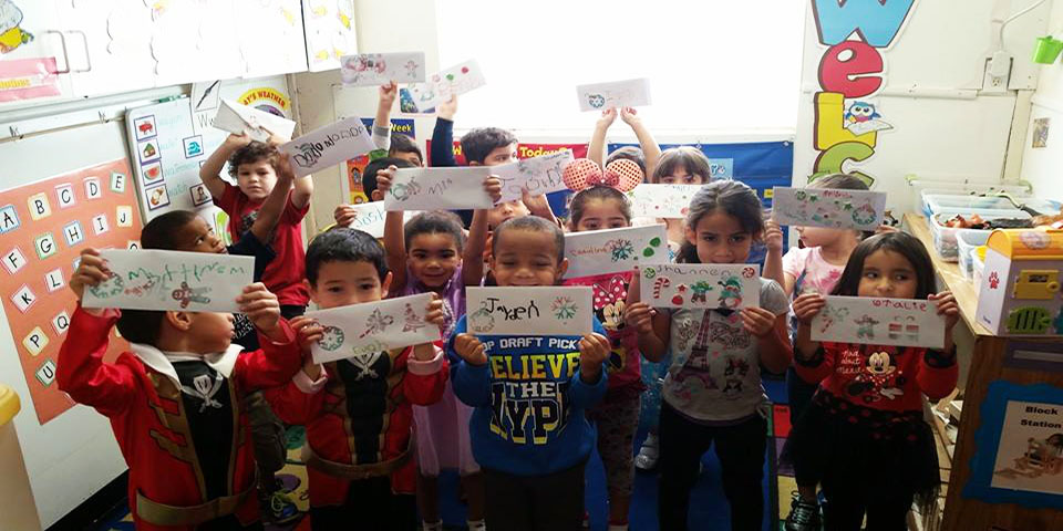 Children Holding Letters For Santa